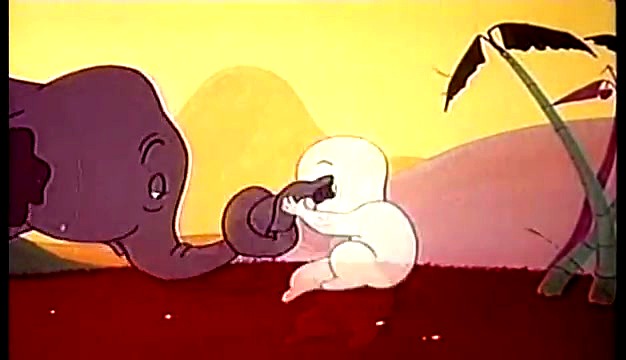 Casper holding the elephant's trunk